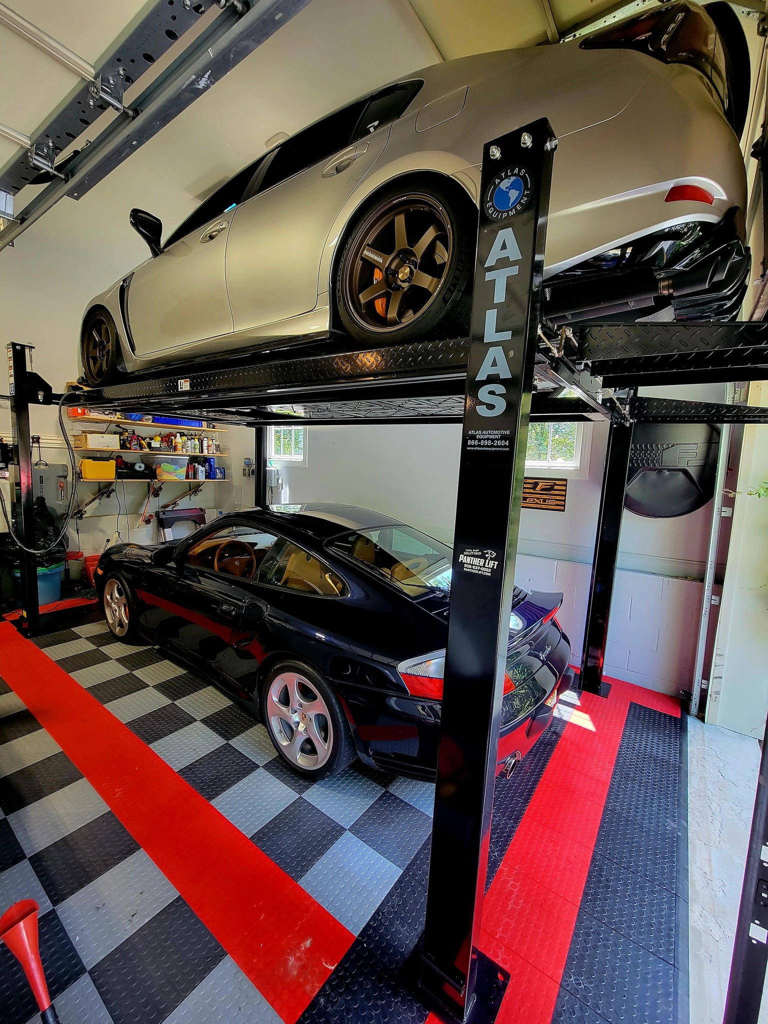 Home garage storage lift with vehicle