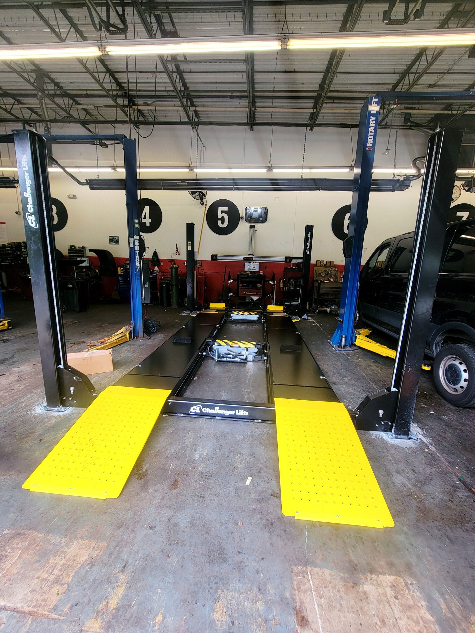 Alignment rack installation with turnplates and slip plates